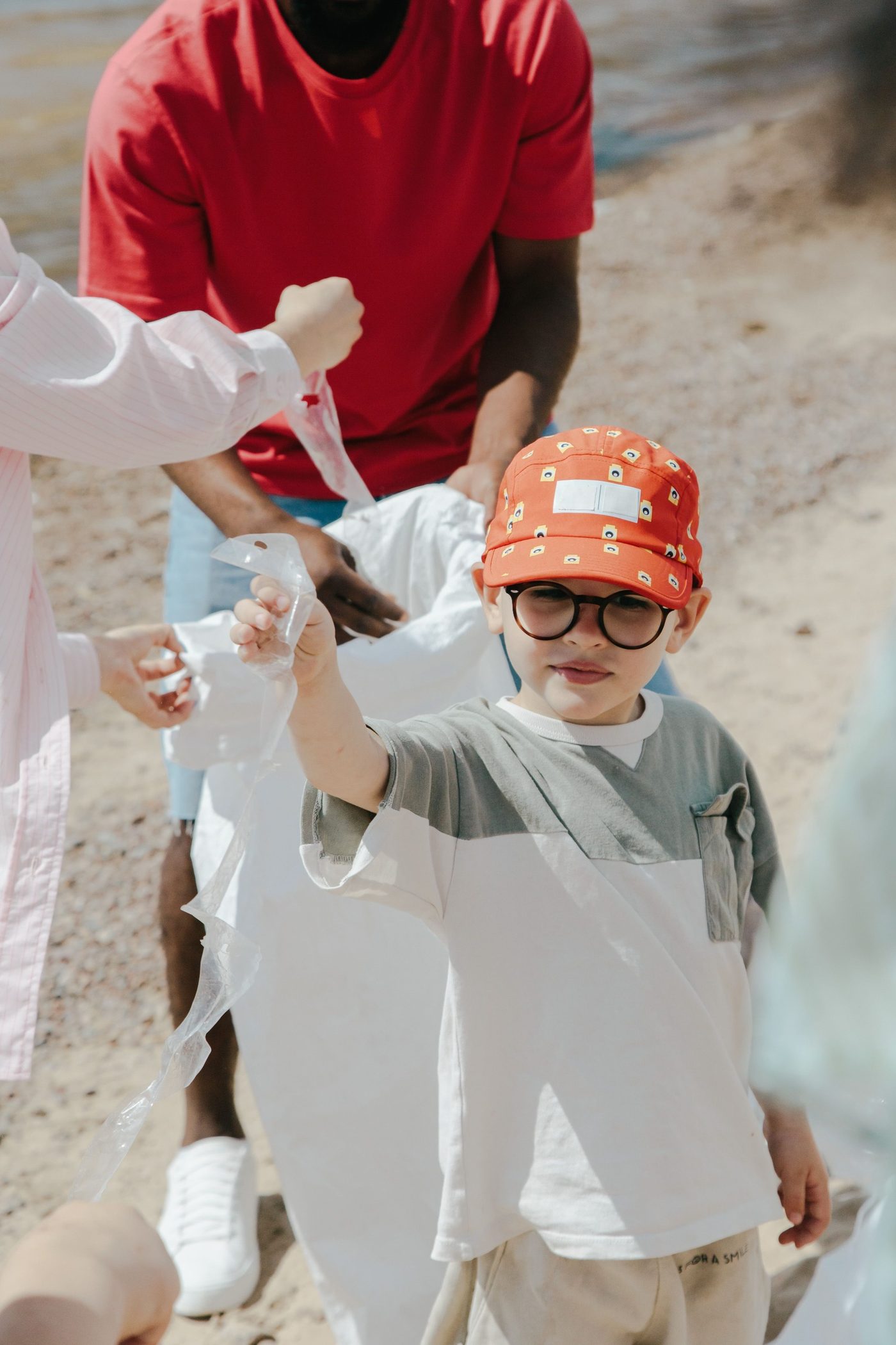 A kid helping with a community cleanup project